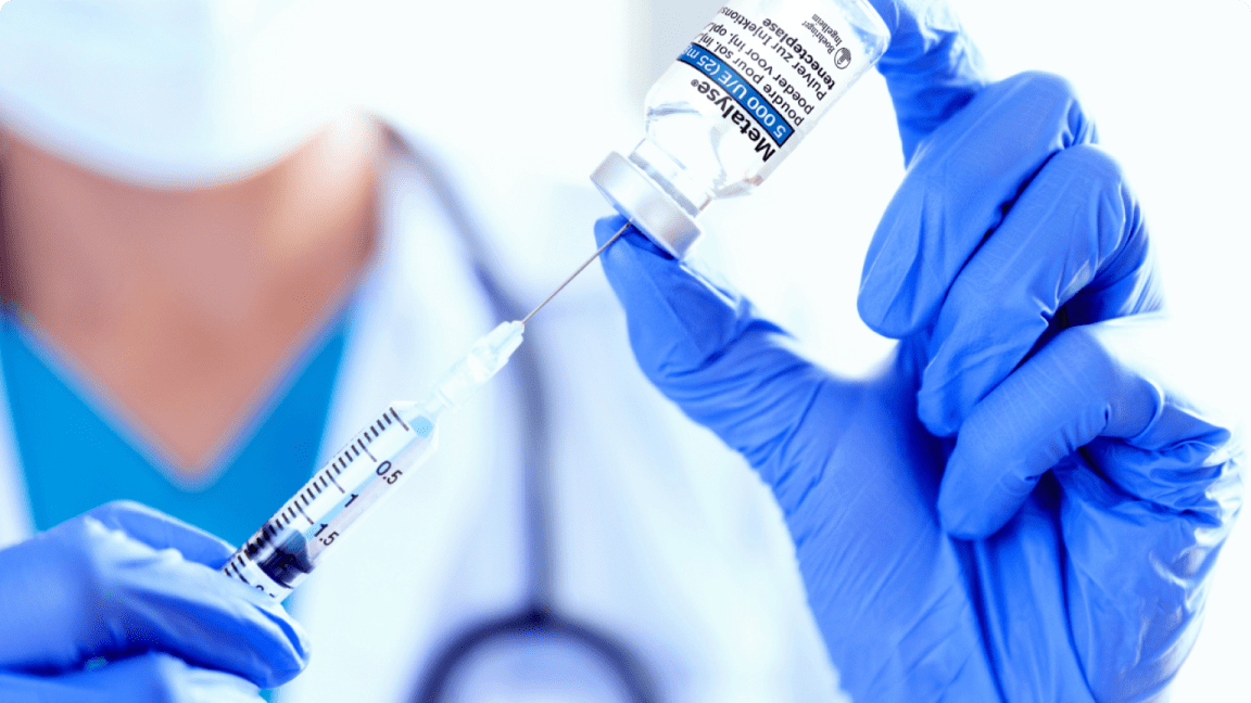 Needle entering stopper of Metalyse® 25 mg (tenecteplase) vial